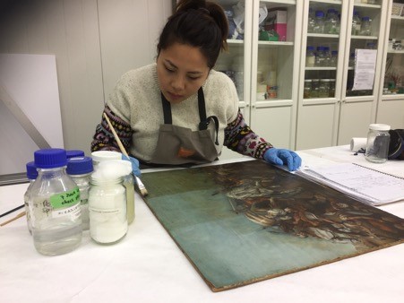 Selina Halim removing an aged varnish and oiled out layer from an oil painting with Xanthan Gum with chelating agent and solvent gel mixtures