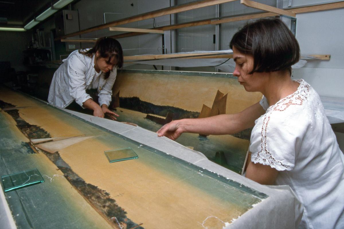 Sue Frost mounting the 20m-long Binney Frieze after its conservation. Image: Andrew Frolows.