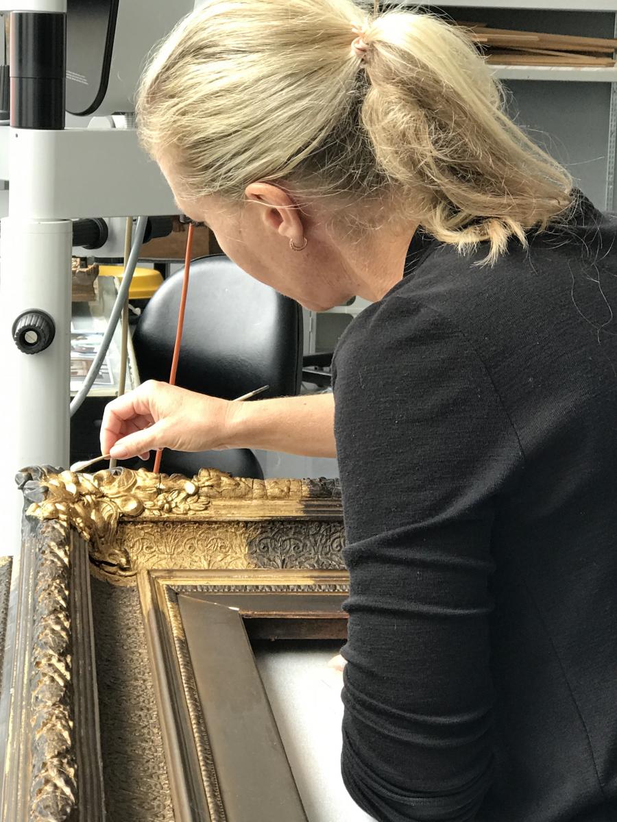 Rosie Heysen swab-cleaning gilded frame