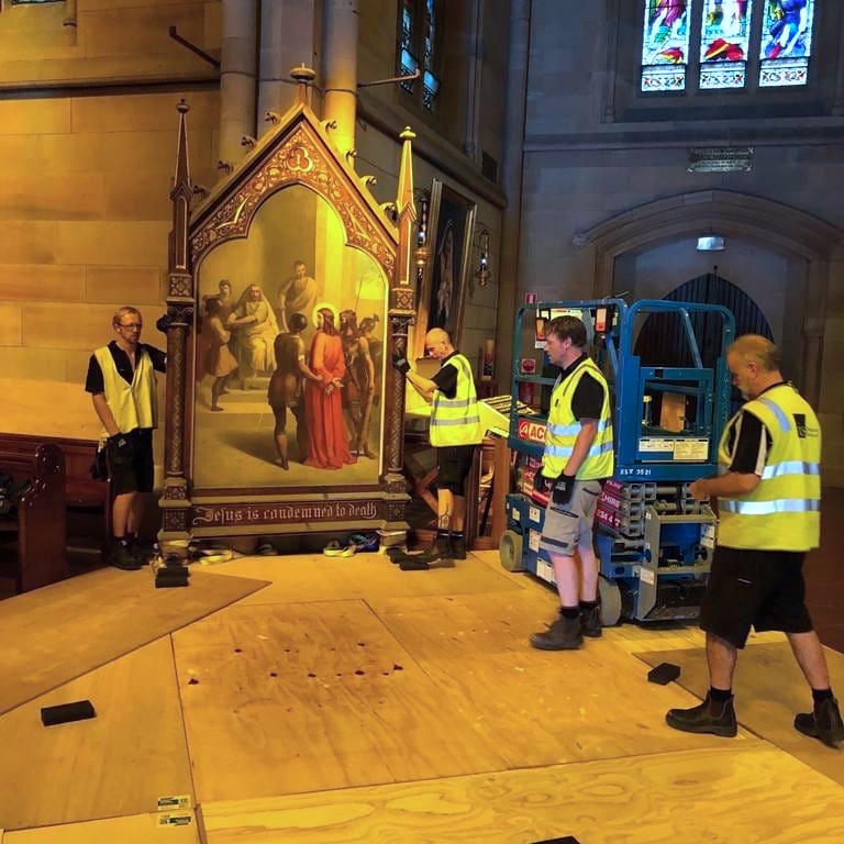 TED removing the Stations of the Cross from the walls at St Mary’s Cathedral.