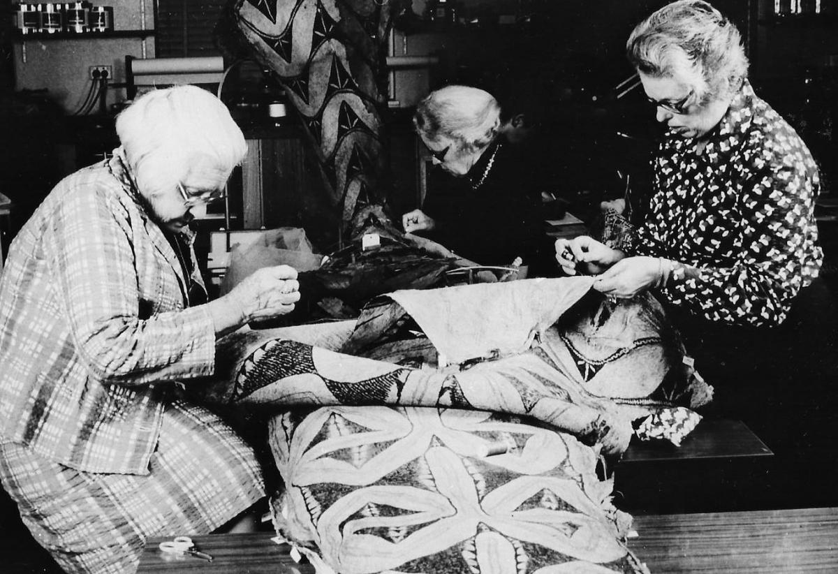 Heather (right) and volunteers working on a large tapa