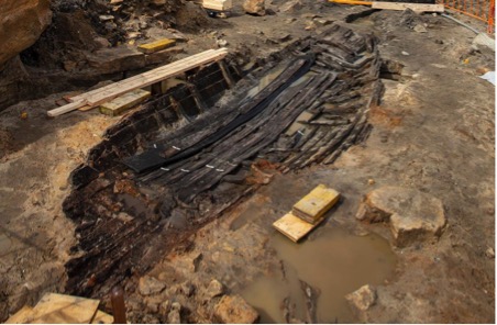 1830s boat uncovered at excavations at Barangaroo (photograph by Sydney Metro, and published by 9News (2018), Historic 180 year old boat uncovered in excavations for Sydney Metro station at Barangaroo.