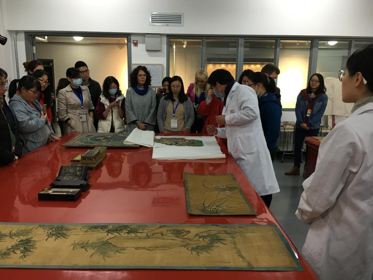 IIC-ITCC participants visiting the calligraphy painting studio at The Palace Museum