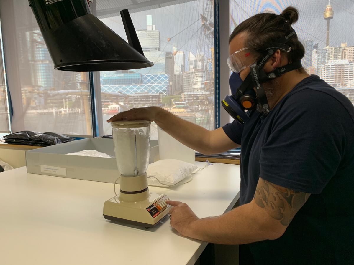 Jeff Fox chopping up offcuts of polyethylene foam using a blender.