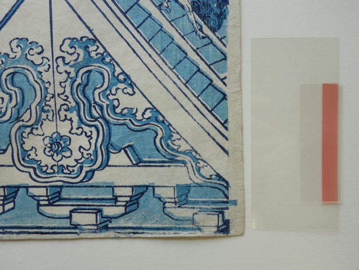 Detail of Secol™ V-strip cut to 5cm with Mylar™ piece inserted inside for safe application (note that the carrier layer of the pressure sensitive adhesive is red). Artwork: Asakusa Hongan-ji temple in the Eastern capital (Edo), c. 1830.