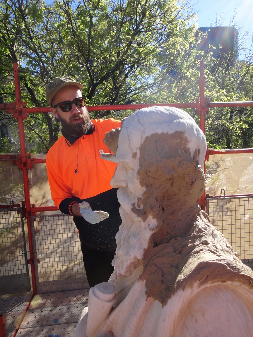 Abby and Stuart undertaking sulphation reduction and removal poulticing of John McDouall Stuart memorial