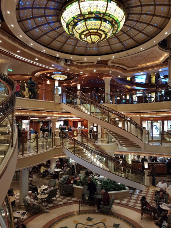 The Piazza of Emerald Princess – the lowest of the three floors shown here – a social hub on the vessel. The panel display and Museum in a suitcase were displayed here. Image: NMA