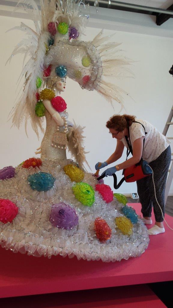 Cotton Blossom costume (96/305/2) by Ron Muncaster 1993-1994, worn 1994, being cleaned following installation by Bronwyn Dunn