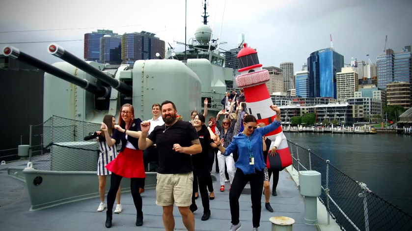 ANMM and Blinky (the inflatable lighthouse) on the deck of HMAS Vampire for the Museum Dance Off. Image by K. Pentecost.