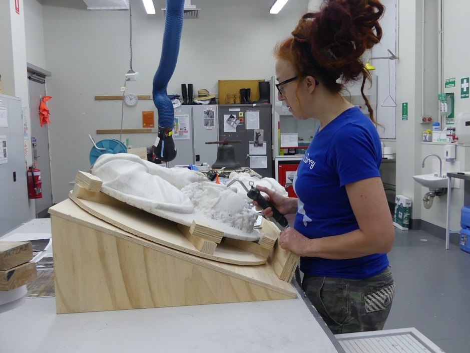 Abby Maxwell Bowen trialling a new conservation technique of blackhead removal on a renaissance marble (Photo thanks to Lord Snowden!)