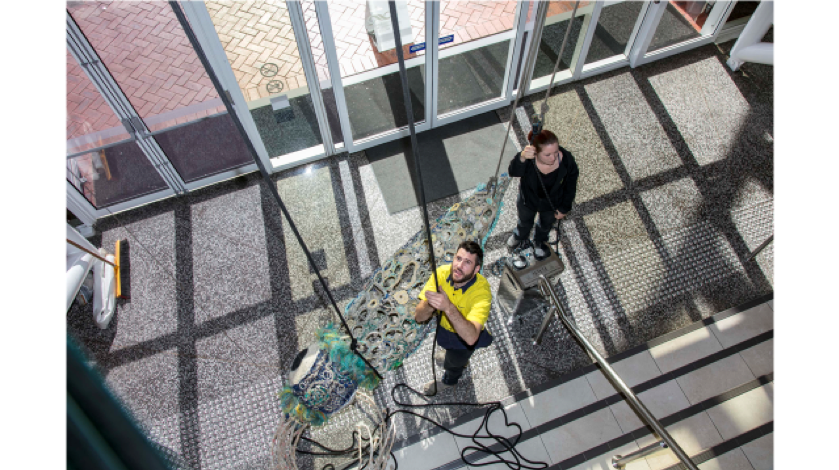 Ghost net sculpture being hosted into position. Image by A. Frolows