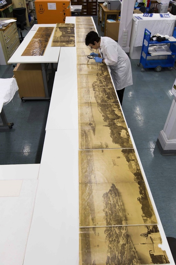 Conservator Trish Leen working on the Bayliss Panorama of Sydney