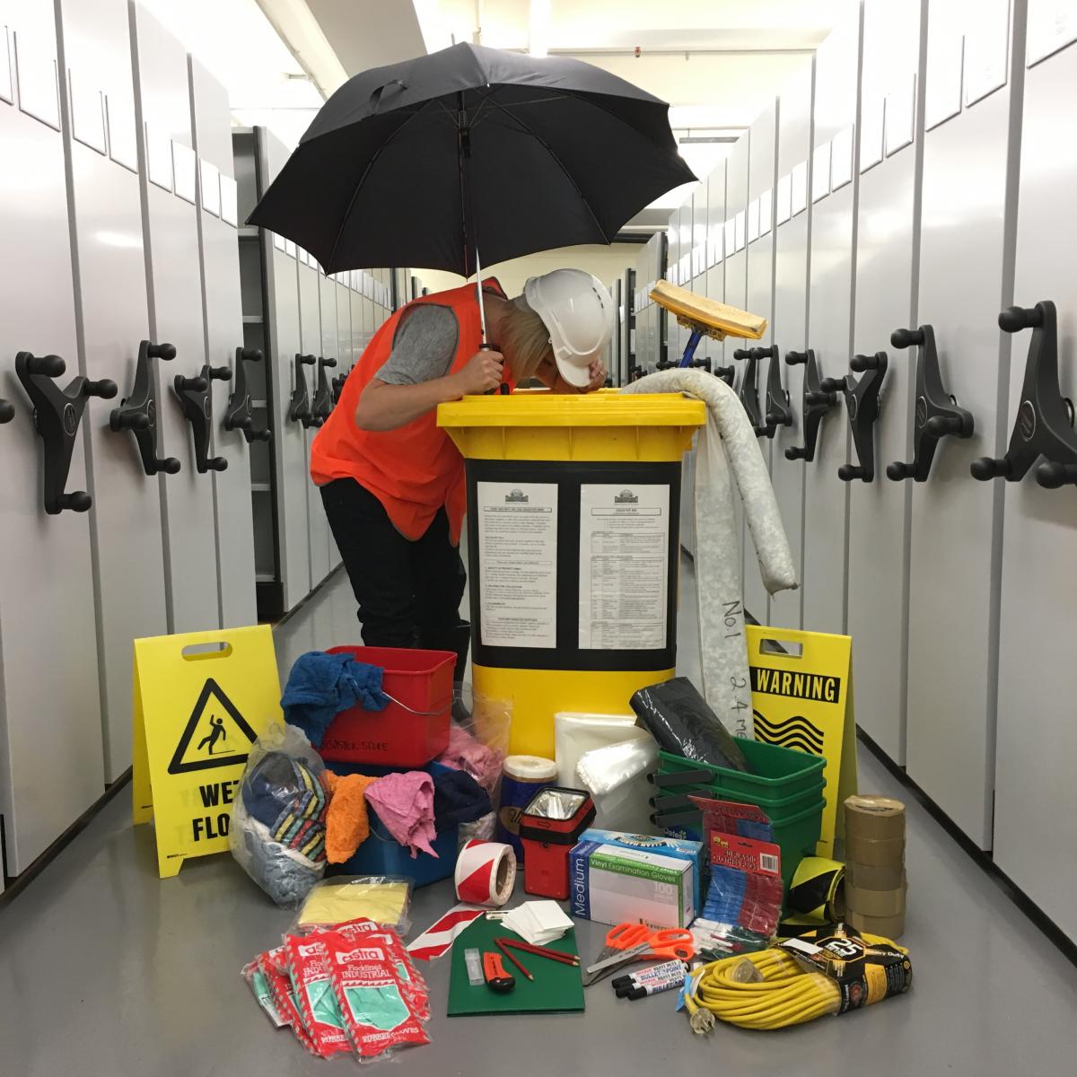 Preservation Manager Kate Holloway shows off our disaster bins