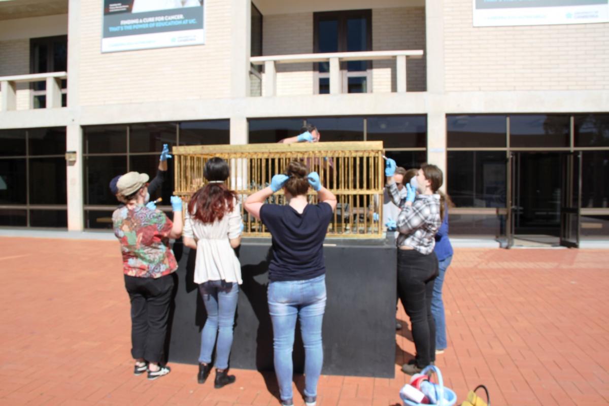Figure 5. Retouching the Gilded Cage by the heritage conservation students. Photo: Mona Soleymani