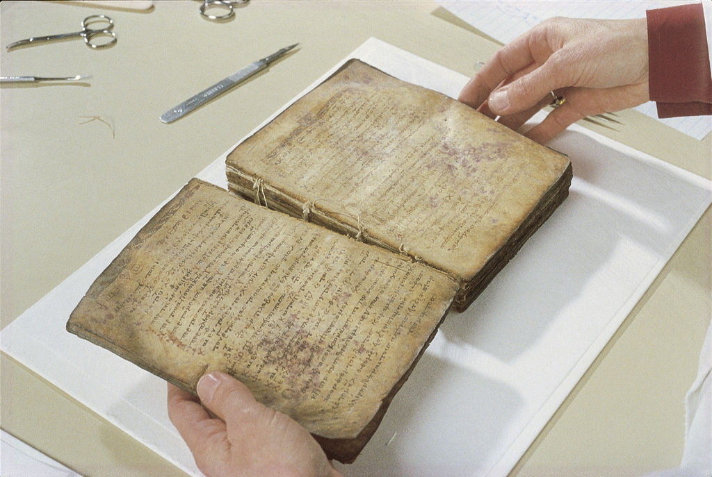The Archimedes Palimpsest: Disbinding the manuscript. Image via the Archimedes Palimpest Project.