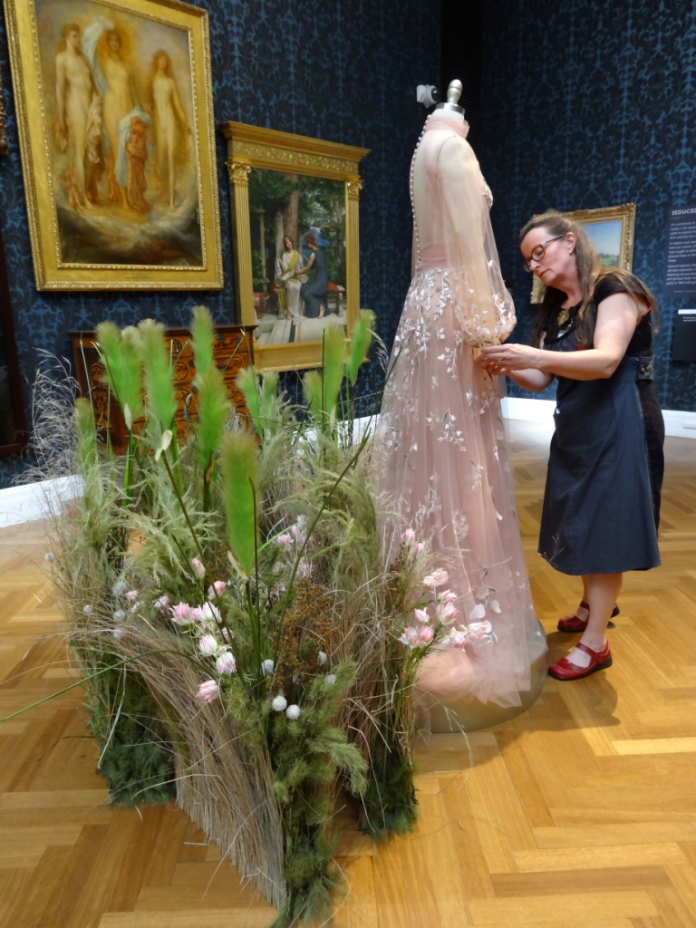 After, with ‘arms’ installed. Art Gallery of South Australia, Paolo Sebastian: X. Paul Vasileff, designer, Australia born 1990, Paolo Sebastian, fashion design company, established 2007, Wildflower gown, Spring/Summer 2017 Wildflowers collection, 2016, Adelaide, silk tulle, cotton. Image: Artlab Australia with permission from the artist