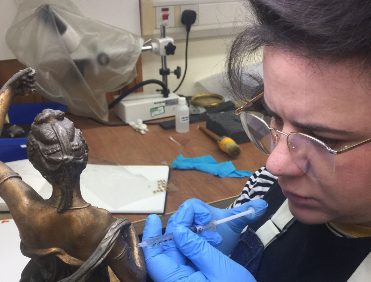 Zora working on bronze sculpture