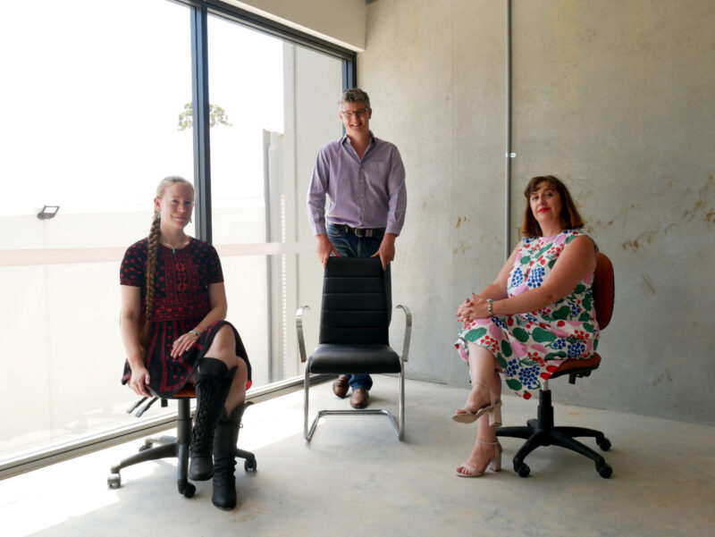 The team in their new ‘office’, excited by the opportunity to argue over interior design preferences.