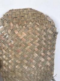 woven basket with Japanese tissue paper repair