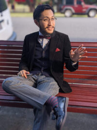 Young man sitting on a bench