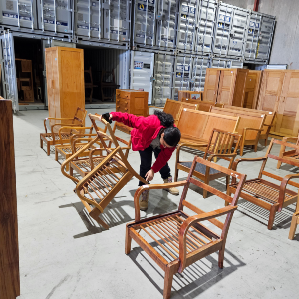 Fred Ward furniture being inspected.